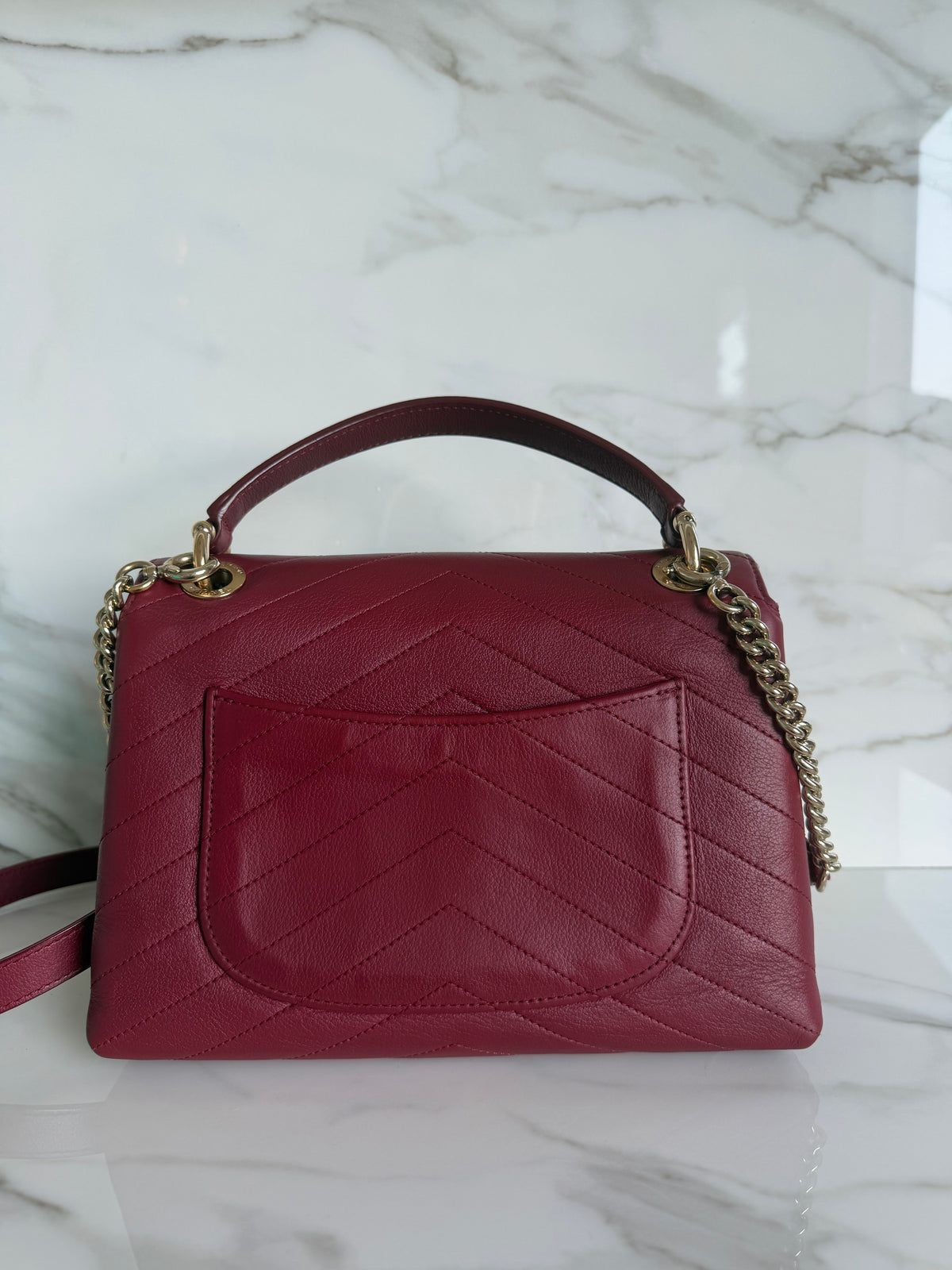 TOP HANDLE CHEVRON BAG IN BURGUNDY CALFSKIN