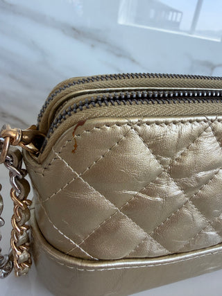 GABRIELLE MINI CLUTCH WITH REMOVABLE CHAIN IN GOLD