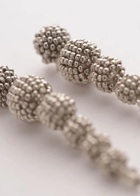 ARETES CASCABEL SERPIENTE PLATINO