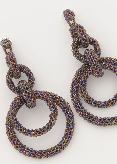 ARETES CINCO AROS CADENA TOPAZ TORNASOL