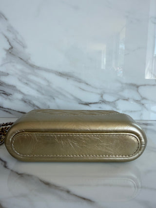 GABRIELLE MINI CLUTCH WITH REMOVABLE CHAIN IN GOLD