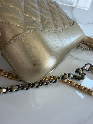 GABRIELLE MINI CLUTCH WITH REMOVABLE CHAIN IN GOLD