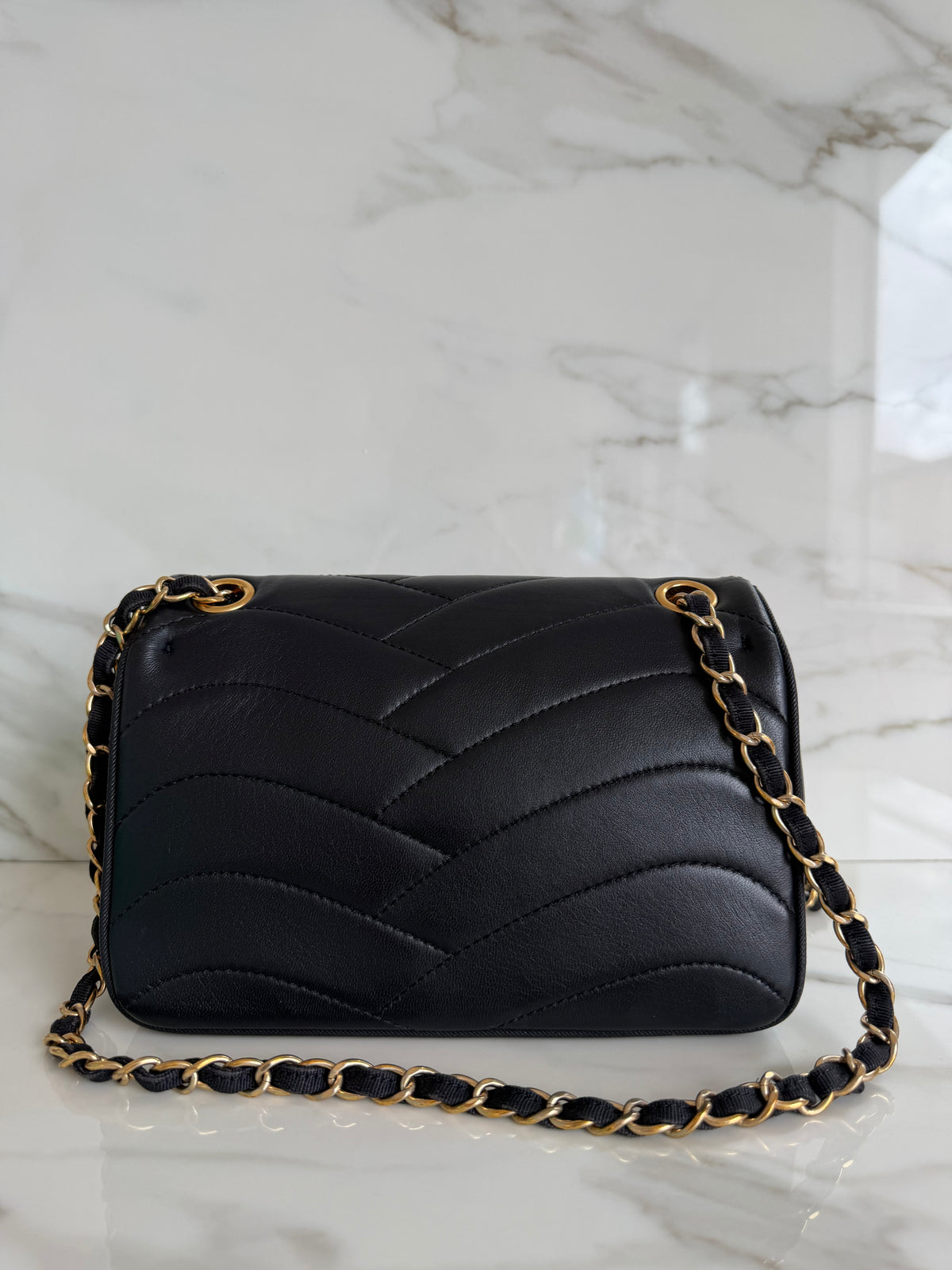 SMALL WAVE PAGODA BAG IN BLACK LAMBSKIN
