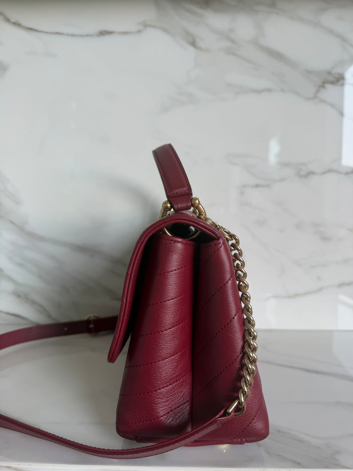 TOP HANDLE CHEVRON BAG IN BURGUNDY CALFSKIN