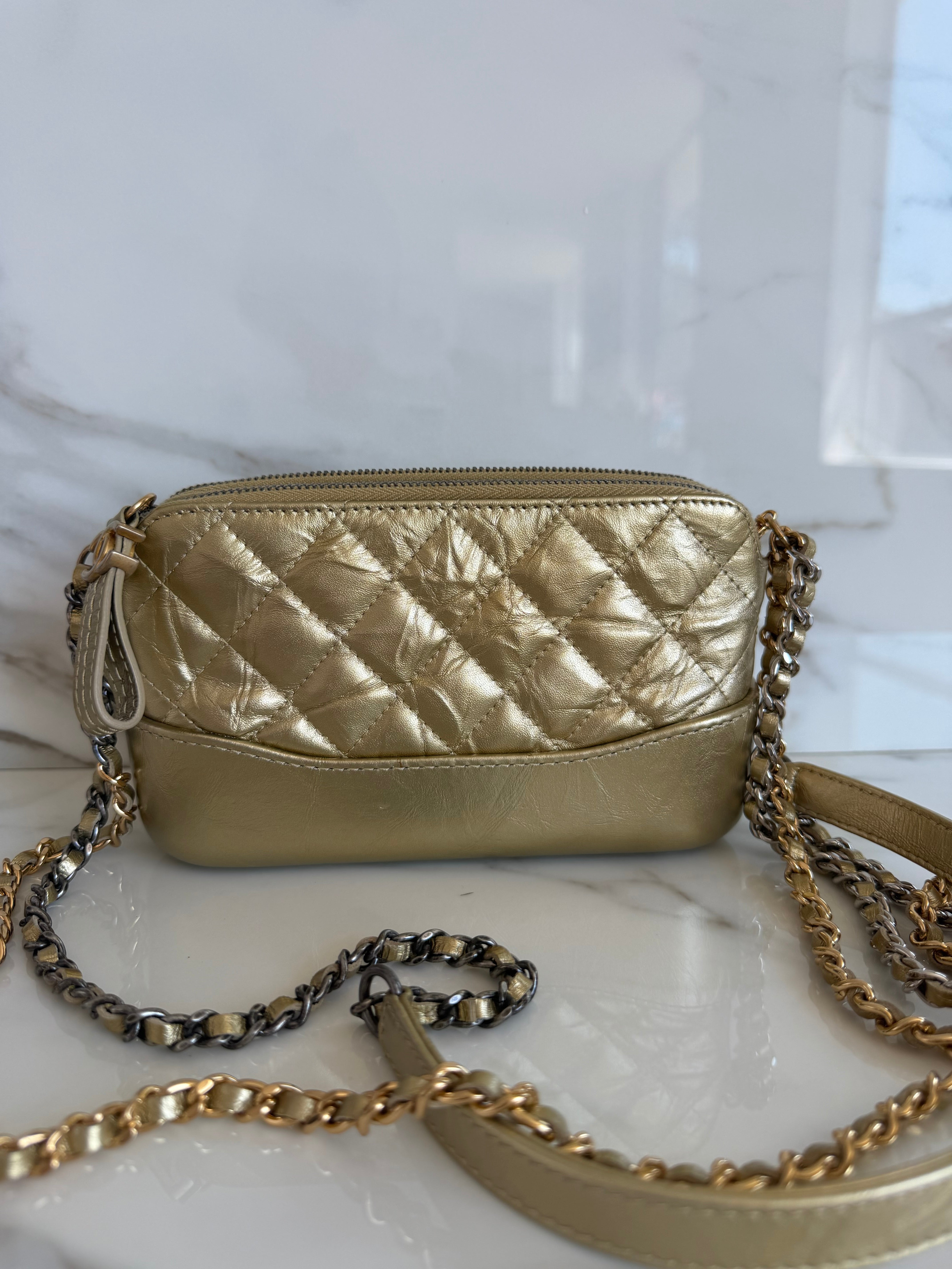 GABRIELLE MINI CLUTCH WITH REMOVABLE CHAIN IN GOLD