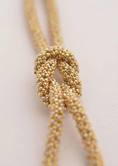 BRAZALETE NUDO TAWARI ORO PLATINO