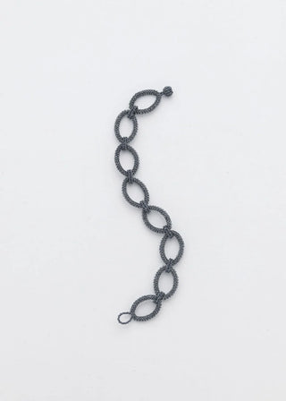 BRAZALETE AROS TAWARI GRIS METALICO