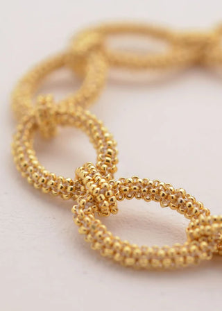 BRAZALETE AROS TAWARI ORO